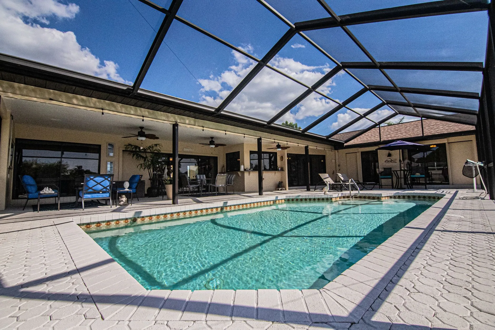 Ground level pool screen enclosure paver deck, Sanford